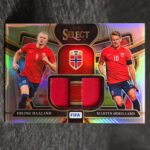 Panini Select FIFA 2023-24 - Dual Swatches - Erling Haaland, Martin Ødegaard, Norway #DS-NOR